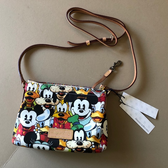 Dooney & Bourke Handbags - DISNEY DOONEY & BOURKE "FACES" NYLON CROSSBODY